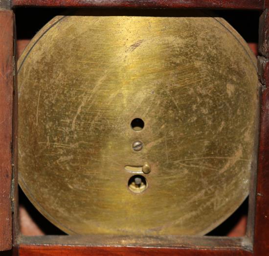 An early 19th century inlaid mahogany mantel timepiece, 16.5in.